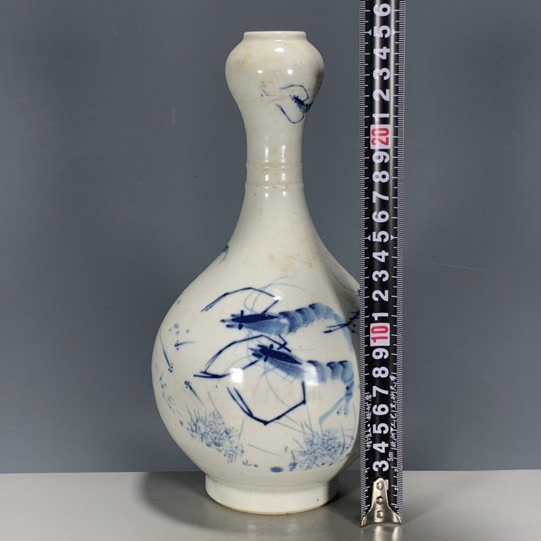 แจกันลายหัวกระเทียมสีน้ำเงินขา - Vintage Collectible Pottery บทวิจารณ์และราคา