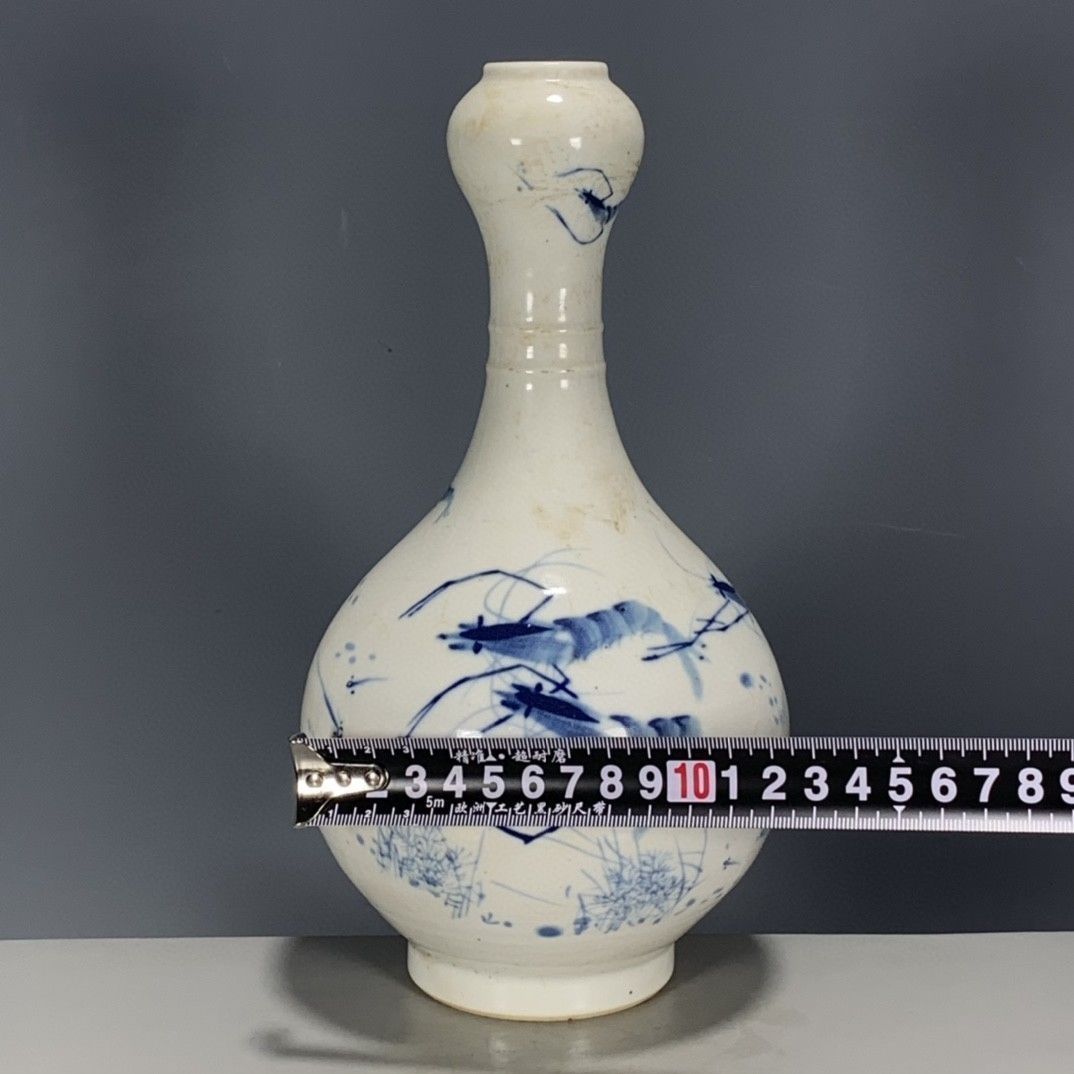 แจกันลายหัวกระเทียมสีน้ำเงินขา - Vintage Collectible Pottery บทวิจารณ์และราคา